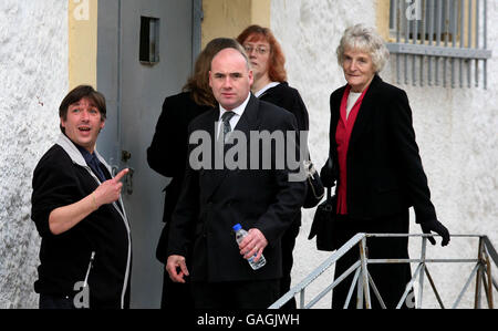 Members of John Hogan's family including his mother Josephine Hogan (far right) wait outside the local prison before he is taken to the court house in Chania, Crete, Greece where he is accused of murdering his six-year-old son, Liam. Stock Photo