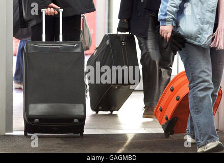 Airports 'coping well' with new baggage rules. Hand baggage at Edinburgh airport. Stock Photo