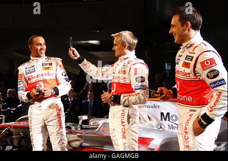 Vodafone McLaren Mercedes drivers, from left, Lewis Hamilton Heikki Kovalainen and Gary Paffet during the launch of the Vodafone McLaren Mercedes MP4-23 at the Mercedes-Benz Museum, Stuttgart. Stock Photo