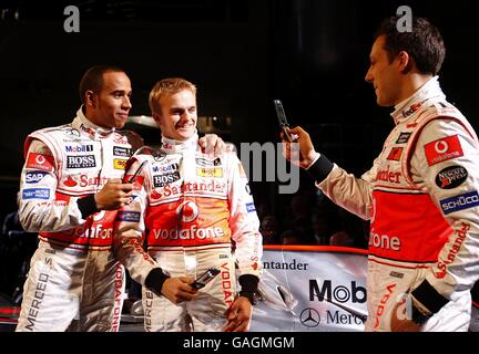 Vodafone McLaren Mercedes drivers, from left, Lewis Hamilton Heikki Kovalainen and Gary Paffet during the launch of the Vodafone McLaren Mercedes MP4-23 at the Mercedes-Benz Museum, Stuttgart. Stock Photo