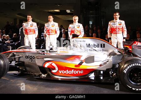 Vodafone McLaren Mercedes drivers, from left, Gary Paffet, Lewis Hamilton, Heikki Kovalainen, and Pedro de la Rosa during the launch of the Vodafone McLaren Mercedes MP4-23 at the Mercedes-Benz Museum, Stuttgart. Stock Photo