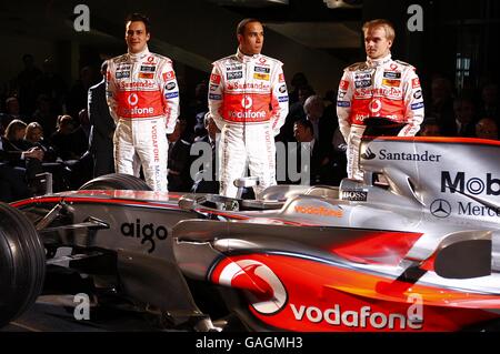 Vodafone McLaren Mercedes drivers, from left, Gary Paffet, Lewis Hamilton and Heikki Kovalainen during the launch of the Vodafone McLaren Mercedes MP4-23 at the Mercedes-Benz Museum, Stuttgart. Stock Photo