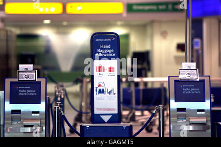 A new sign showing passengers baggage allowance at British Airways's Premium check-in area at Heathrow Airport's Terminal 1, London, Stock Photo