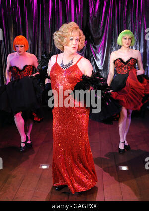 Douglas Hodge performs as Albin (centre) during a rehearsal for La Cage Aux Folles at the Menier Chocolate Factory in central London. Stock Photo