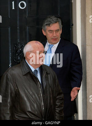 British Prime Minister Gordon Brown bids farewell to former Soviet President Mikhail Gorbachev (left) after their meeting at 10 Downing Street, London. Stock Photo