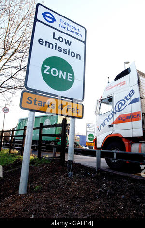 Photo. A sign displaying the start of the new 'Emission Zone' at the Heston Roundabout where the A312 meets the M4 roadways. Stock Photo