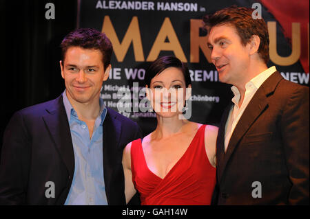 (Left to right) Julian Ovenden (who plays Armand), Ruthie Henshall (Maguerite) and Alexander Hanson (Otto) attend a photocall to launch the new musical Marguerite at the Pigalle Club in Piccadilly, central London. Stock Photo