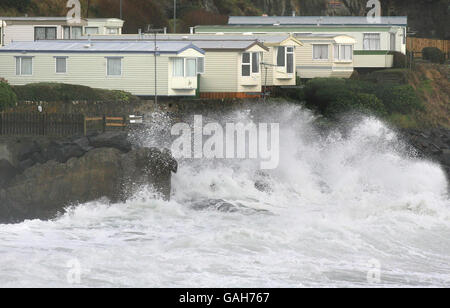 Rough seas at Ballycastle in Co Antrim. Warnings of 70mph gales later this afternoon has delayed new attempts to re-float the Portrush Lifeboat which is stranded on rocks at Rathlin Island. Stock Photo