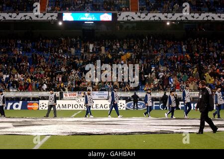 The ballboys gather around the giant UEFA Champions League starball logo Stock Photo