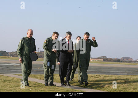 British Prime Minister Gordon Brown meets members of the RAF Search and Rescue crew that airlifted crew members from the Riverdance ferry, that ran aground off Blackpool in January of this year, during a visit to RAF Valley on Anglesey. Stock Photo