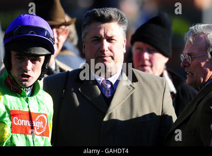 Jockey Ruby Walsh (left) trainer Paul Nicholls and Owner Clive Smith (right) after Kauto Star won The Commercial First Ascot Steeple Chase at Ascot Racecourse, Berkshire. Stock Photo