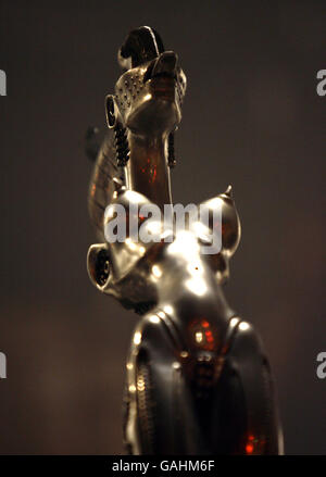 A microphone stand designed by Swiss surrealist H. R. Giger (who designed the Alien in the eponymous films) used in concert by American rock band Korn, on stage at the Brixton Academy in south west London. Stock Photo