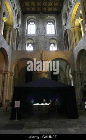 STANDALONE Photo. Diners enjoy a two dimensional virtual meal at Winchester Cathedral, a new interactive artwork entitled In Other People's Skins. Stock Photo