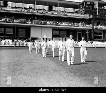 Cricket - The Wisden Trophy - Second Test - England v West Indies - First Day. England captain Ray Illingworth (second r) leads his team out Stock Photo