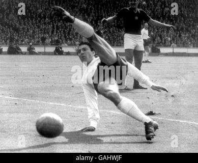 England's Jimmy Greaves misses the ball completely as he attempts a spectacular scissors kick Stock Photo