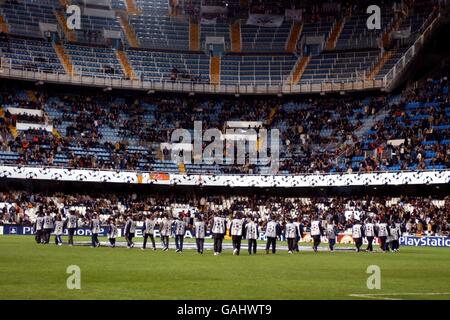 Soccer - UEFA Champions League - Group B - Valencia v Ajax. Ballboys surround the giant UEFA Champions League starball logo in the centre circle Stock Photo