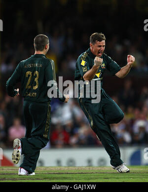 Australia's Brad Hogg celebrates claiming wicket of India's Yuvraj Singh during the Commonwealth Bank Series 1st Final between Australia v India Stock Photo