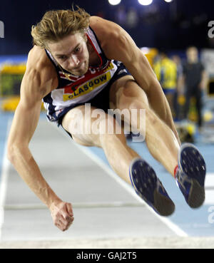 Great Britain's Christopher Tomlinson competes in the Men's Long Jump during the Norwich Union International match at Kelvin Hall, Glasgow. Stock Photo