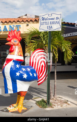 MIAMI, FLORIDA - APRIL 25, 2016: Colorful rooster statue along Calle Ocho in the Little Havana section of Miami. Stock Photo