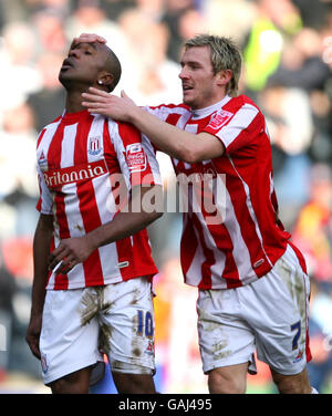 Stoke City's Ricardo Fuller celebrates with Liam Lawrence after winning a penalty during the Coca-Cola Championship match at the Britannia Stadium, Stoke. Stock Photo