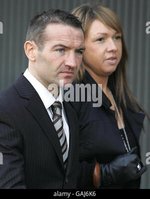 Former world champion boxer Scott Harrison arrives at Glasgow Sheriff Court with an unidentified female, where he is charged with assaulting PC Gray of Strathclyde Police on April 22 2006. Stock Photo