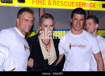 Uma Thurman arrives with firemen for the UK premiere of The Accidental Husband at the Vue Cinema in Leicester Square, London. Stock Photo
