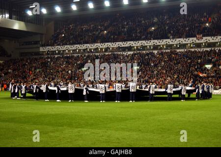 The ballboys gather around the giant UEFA Champions League starball logo Stock Photo