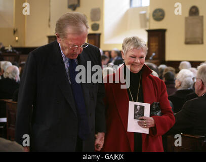 Sir David Frost and Dame Judi Dench leave a memorial service for the late broadcaster Ned Sherrin CBE, held at St Paul's Church in Covent Garden, central London. Stock Photo