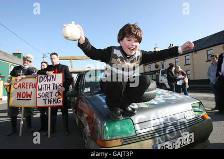 Nine-year-old Brendan Leydon from west Cork takes part in the banger rally during the 2nd annual Father Ted festival in Kilfenora Co. Clare. Stock Photo