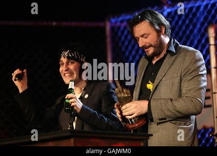 Julian Barratt and Noel Fielding (left) on stage with the Award for Best TV Show received for The Mighty Boosh during the Shockwaves NME Awards 2008 at The O2 Arena, Millennium Way, Greenwich, SE10. Stock Photo