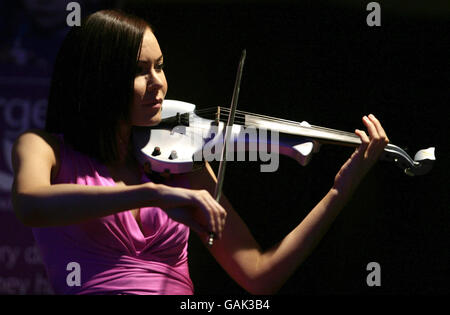 Linzi Stoppard and her new band FUSE (members Linzi Stoppard and Ben Lee) launch the 'Share a Stage at Glastonbury' competition - to find a young band or musician to play with them at Glastombury Festival 2008 - at the Intercontinental Hotel, Park Lane, London, England. Stock Photo