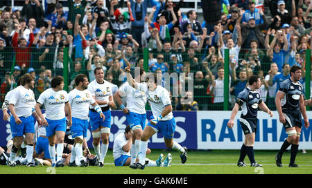 Italy's players celebrate after their team defeated Spain during a ...