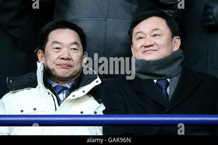 Soccer - Barclays Premier League - Bolton Wanderers v Manchester City - Reebok Stadium. Manchester city owner Thaksin Shinawatra (right) Stock Photo