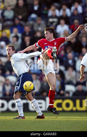 Preston North End's Eddie Lewis and Nottingham Forest's David Prutton battle for the ball Stock Photo