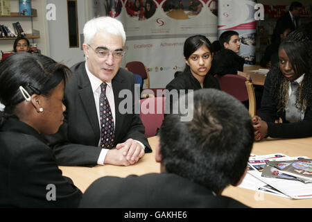 Chancellor Alistair Darling talks to pupil at the launch of a new National Enterprise Academy at Swanlea School Business and Enterprise College in east London. Stock Photo