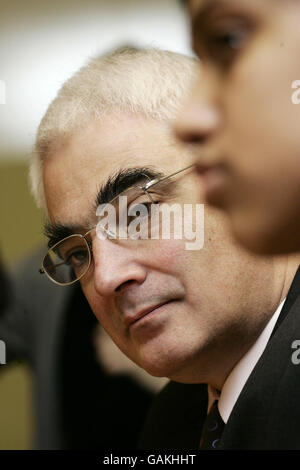 Chancellor Alistair Darling talks to pupils at the launch of a new National Enterprise Academy at Swanlea School Business and Enterprise College in east London. Stock Photo