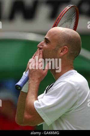 Tennis - Australian Open - Mens Singles Final.. Andre Agassi (USA) throws kisses to the crowd after winning the Mens Singles Final against Rainer Schuettler (GER). Stock Photo