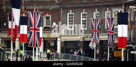 French national flags fly alongside the Union Jack in the town centre of Windsor in Berkshire, ahead of the two-day State Visit by France's President Nicolas Sarkozy due to start tomorrow. Stock Photo