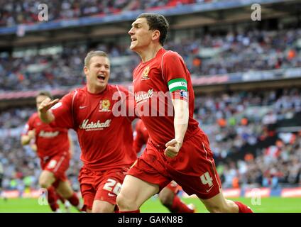 Soccer - Johnstone's Paint Trophy Final - Milton Keynes Dons v Grimsby Town - Wembley Stadium. Milton Keynes Dons' Keith Andrews celebrates scoring the opening goal of the game from the penalty spot Stock Photo
