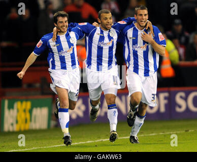 Soccer - Coca-Cola Football League Championship - Sheffield United v Sheffield Wednesday - Bramhall Lane. Sheffield Wednesday's Adam Bolder (l) celebrates his goal with Deon Burton and Tommy Spurr Stock Photo