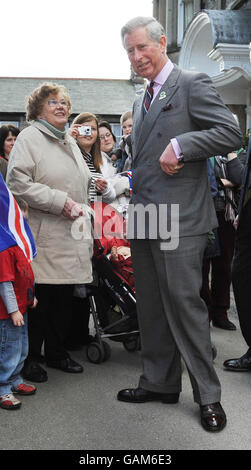 Prince Charles meets the public after he unveiled a plaque at the village shop in Ravenstonedale, Cumbria alongside owners Alan and Louise Dinnes. The shop is part of the 'Black Swan' pub in Ravenstonedale, which has been transformed by the Prince's 'Pub Is The Hub' initiative, which has helped to regenerate 300 locals across Britain. Stock Photo