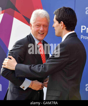 Former US President Bill Clinton (left) is greeted by Foreign Secretary David Miliband at the first working session of the Progressive Governance Summit in Hertfordshire today. Stock Photo