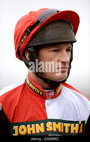 Horse Racing - The 2007 John Smith's Grand National Meeting - Aintree Racecourse. Jockey Paul Carberry Stock Photo
