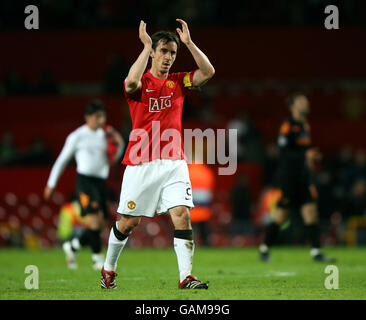 Soccer - UEFA Champions League - Quarter Final - Second Leg - Manchester United v AS Roma - Old Trafford. Manchester United's captain Gary Neville celebrates after the final whistle Stock Photo