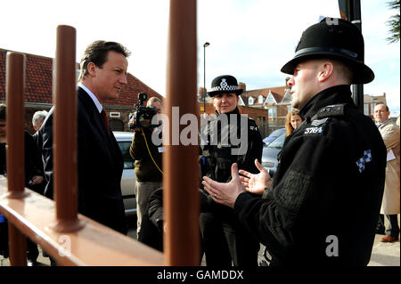 Conservative Leader David Cameron talks to police officers in Whitley Bay today ahead of the start of the Conservative Party annual Spring Forum Conference at the Sage in Gateshead. Stock Photo