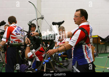 Archery - British Paralympic Association - Training - Lilleshall National Sports Centre. Team Great Britain's Noel Parker (right) takes aim during a training session at Lilleshall National Sports Centre, Newport. Stock Photo