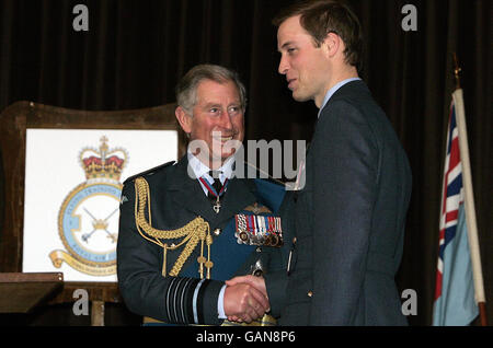 Prince William receiving his RAF wings from his father the Prince of Wales at RAF Cranwell in Lincolnshire. Stock Photo