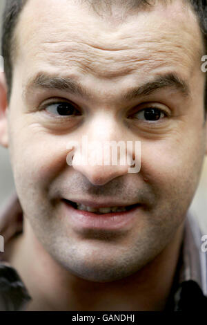 TV and radio presenter Martin Lewis outside the High Court on the bank charges test case judgement day. Charges levied by banks for unauthorised overdrafts are subject to regulation by the Office of Fair Trading under "unfair contract" rules, the High Court ruled today. Stock Photo
