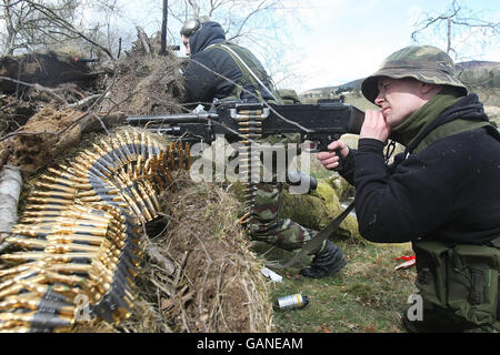 Members of the Irish Defence Forces take part in a full military exercise in the Glen of Imaal Co.Wicklow, Ireland in advance of their deployment to Chad in a few weeks time. Stock Photo