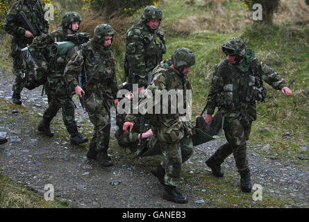 Members of the Irish Defence Forces take part in a full military exercise in the Glen of Imaal Co.Wicklow, Ireland in advance of their deployment to Chad in a few weeks time. Stock Photo